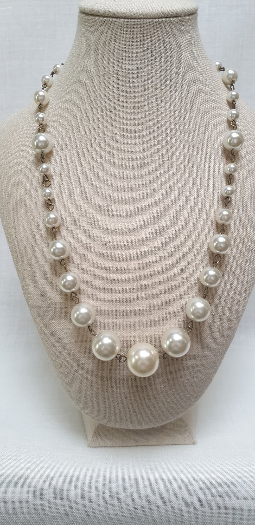 Faux pearl necklace