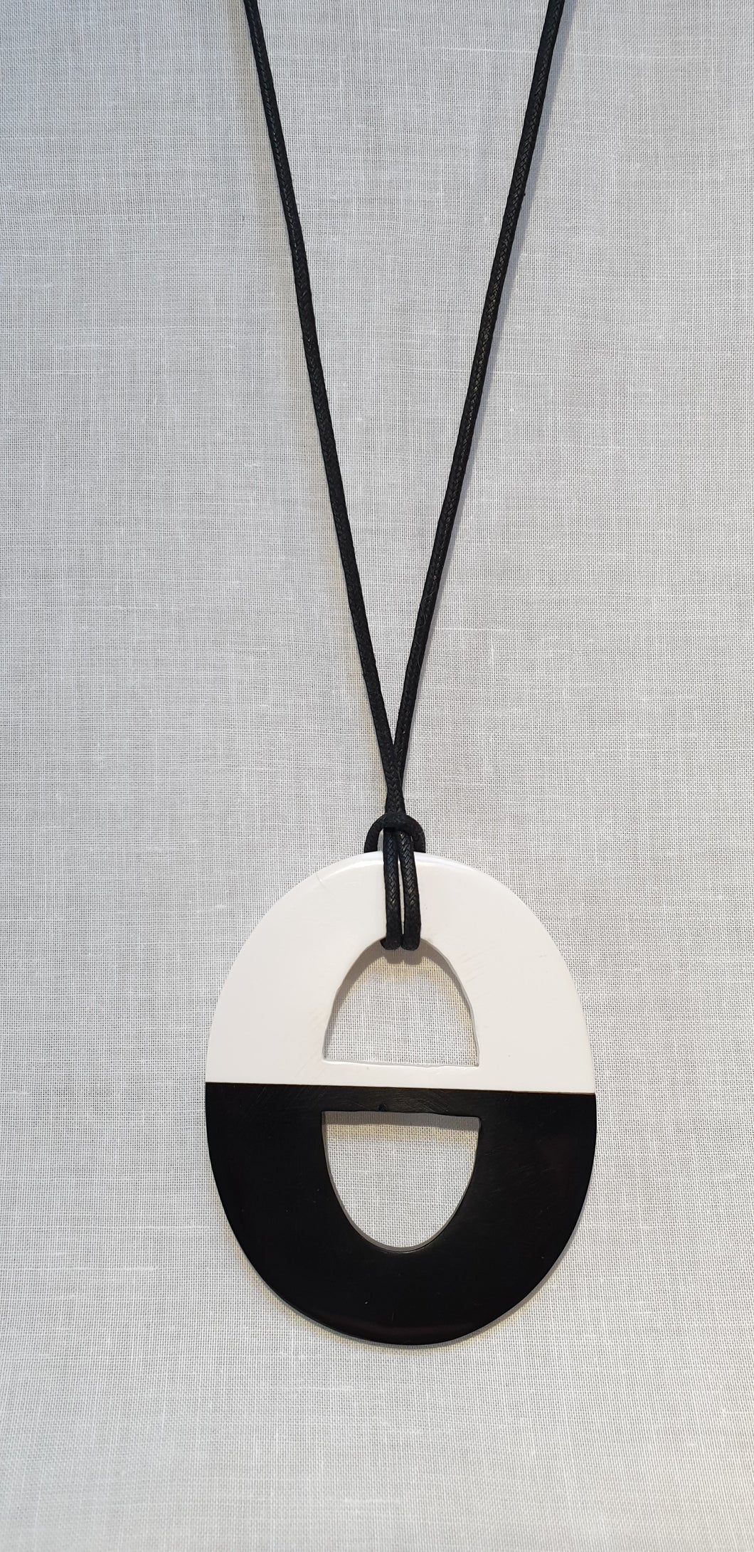 Striking black and white pendant