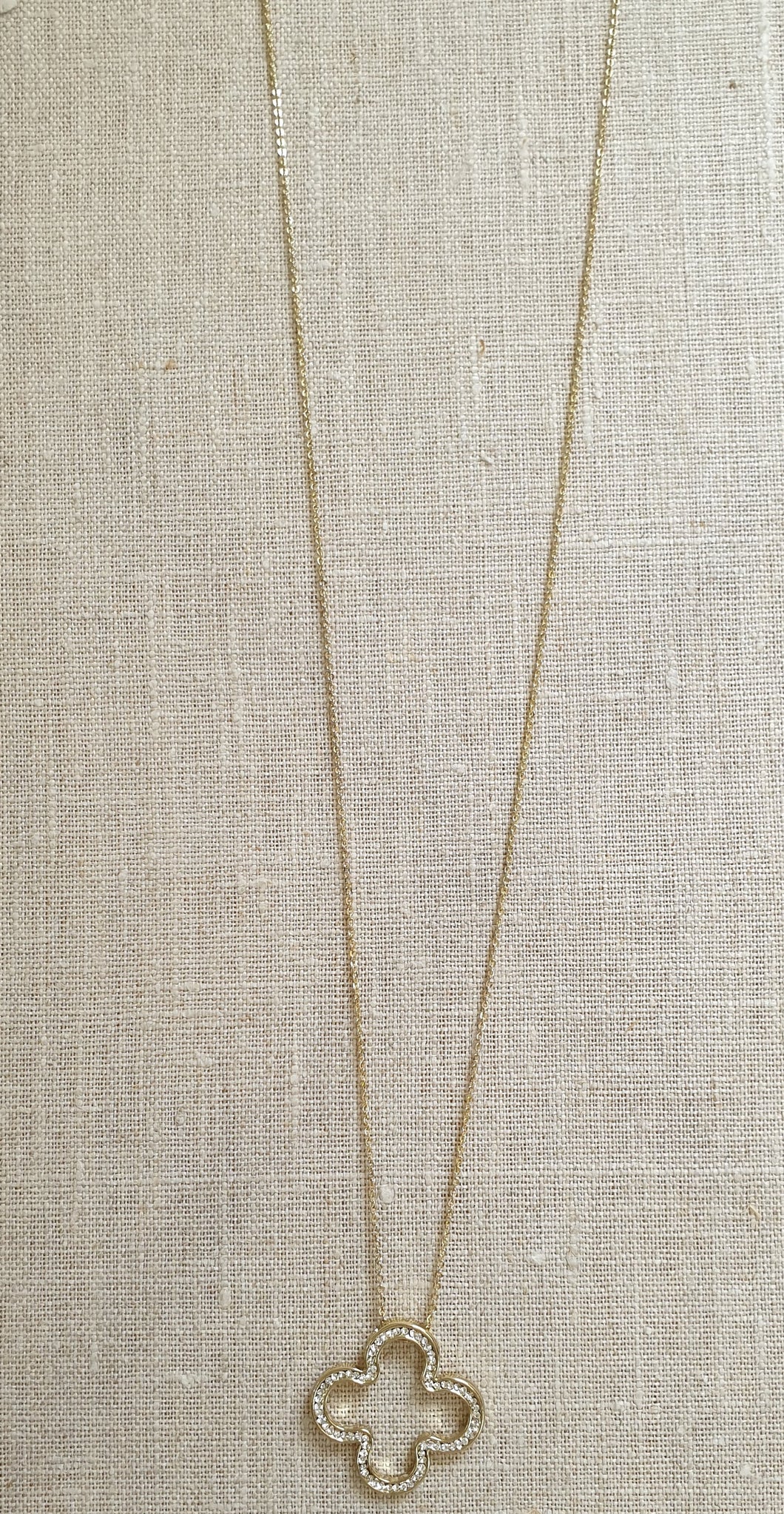 Long gold chain with pendant